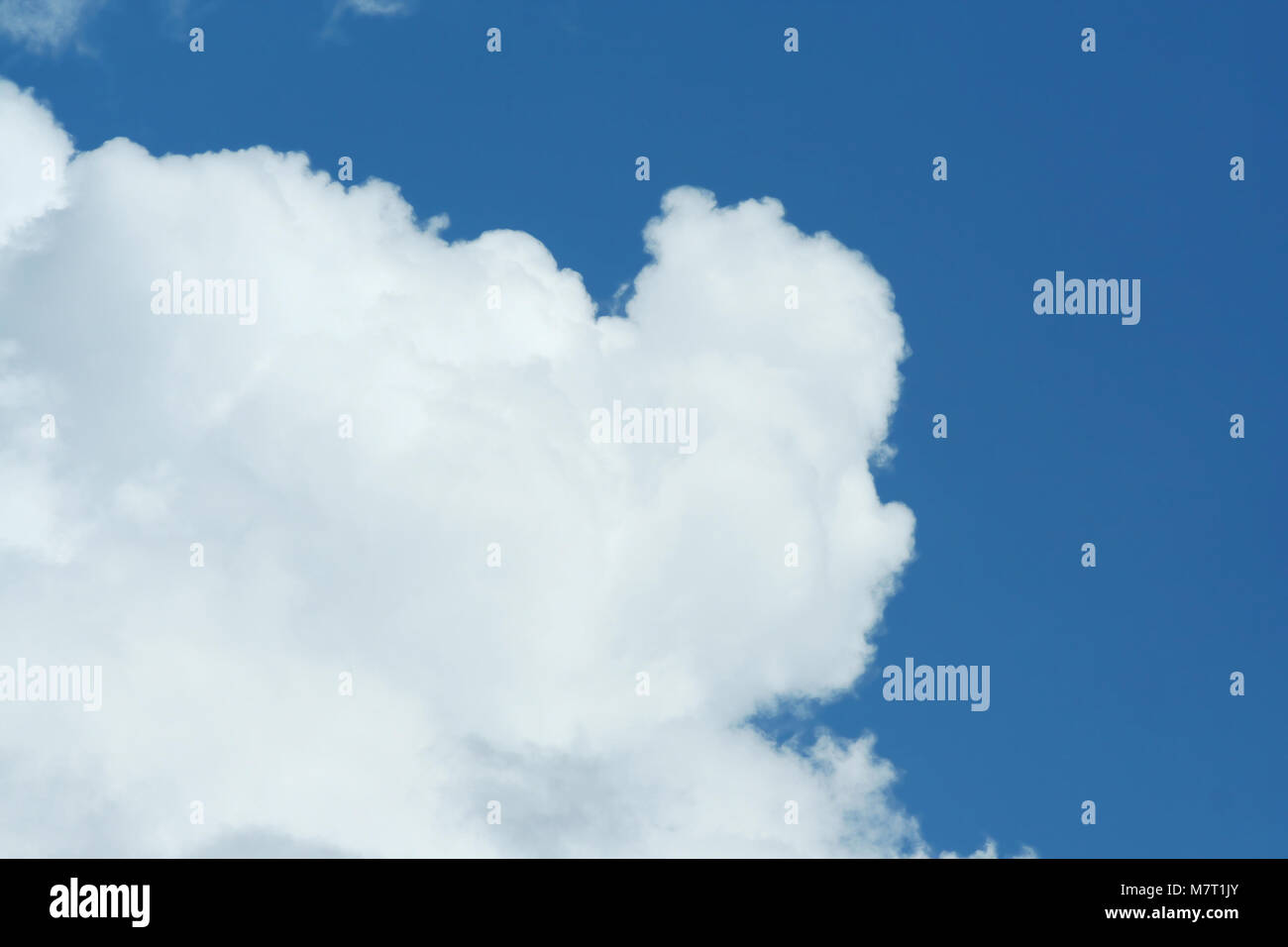 A puffy white cloud with blue sky Stock Photo - Alamy