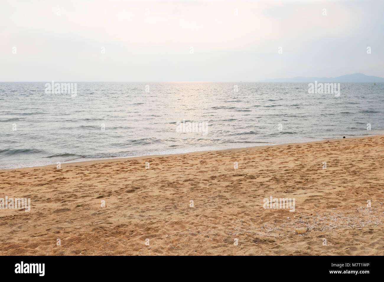 Sand beach and blue sky Stock Photo - Alamy