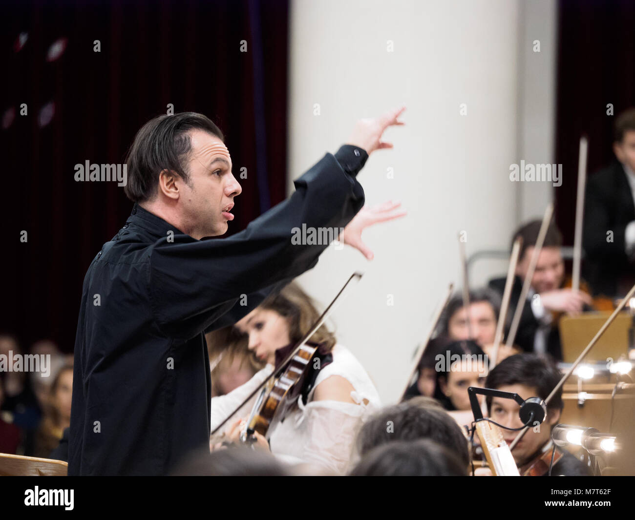 Saint Petersburg, Russia - November 23 2017.  Conductor of the Symphony Orchestra of the Perm Academic Theater of Opera and Ballet named after P. Tcha Stock Photo