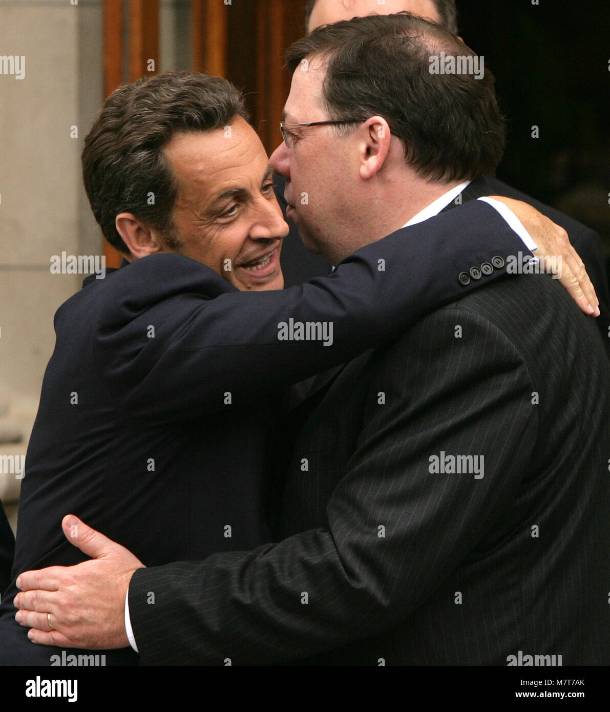French President Nicolas Sarkozy hungs Taoiseach Brian Cowen after his day long visit to Government Buildings in Dublin, Monday 21, July 2008. Sarkozy met the two main opposition leaders - Fine Gael's Enda Kenny,  Labour's Eamon Gilmore and talks with groups who opposed and supported the Lisbon Treaty. Photo/Paul McErlane Stock Photo