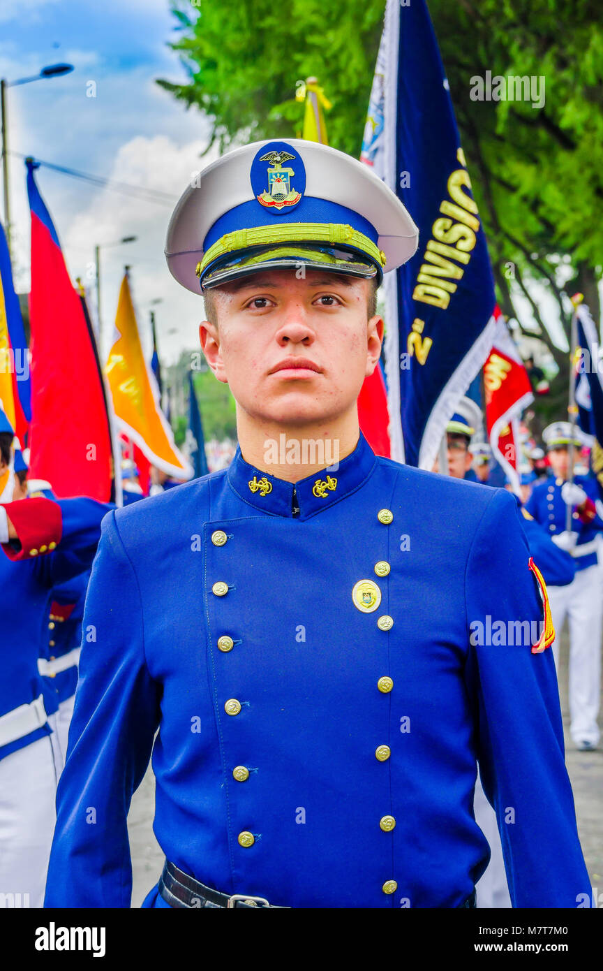 Quito, Ecuador - January 31, 2018: Portrait of unidentifed man wearing a blue uniform of Liceo naval, and walking during a parade in Quito, Ecuador Stock Photo
