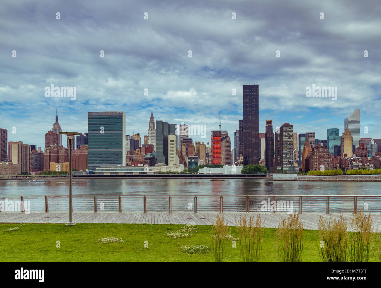 Midtown Manhattan and The United Nations Building  across The East River from Gantry Plaza State Park in Long Island City ,Queens , New York Stock Photo