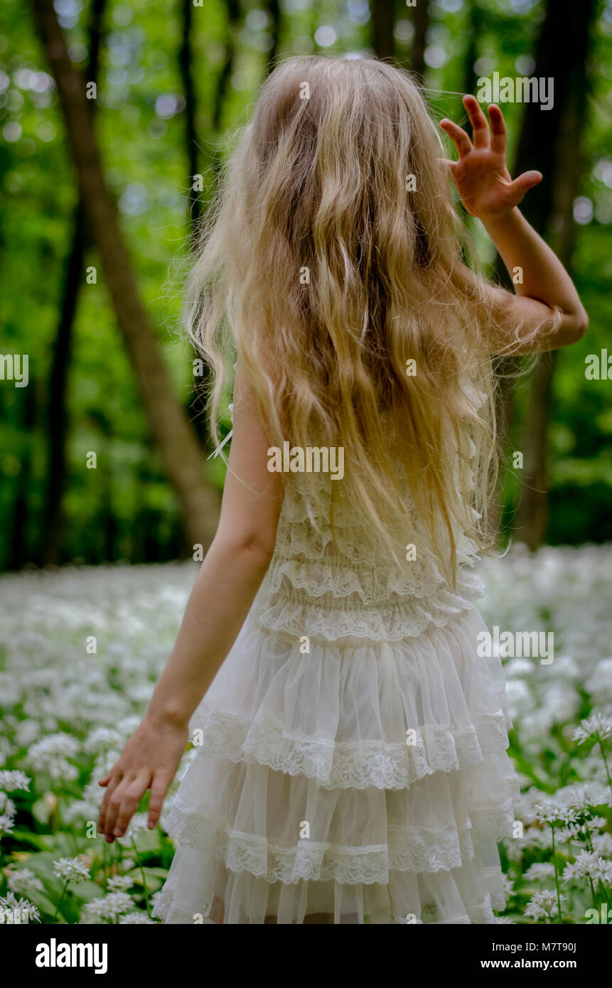little girl with long blond hair back view Stock Photo - Alamy