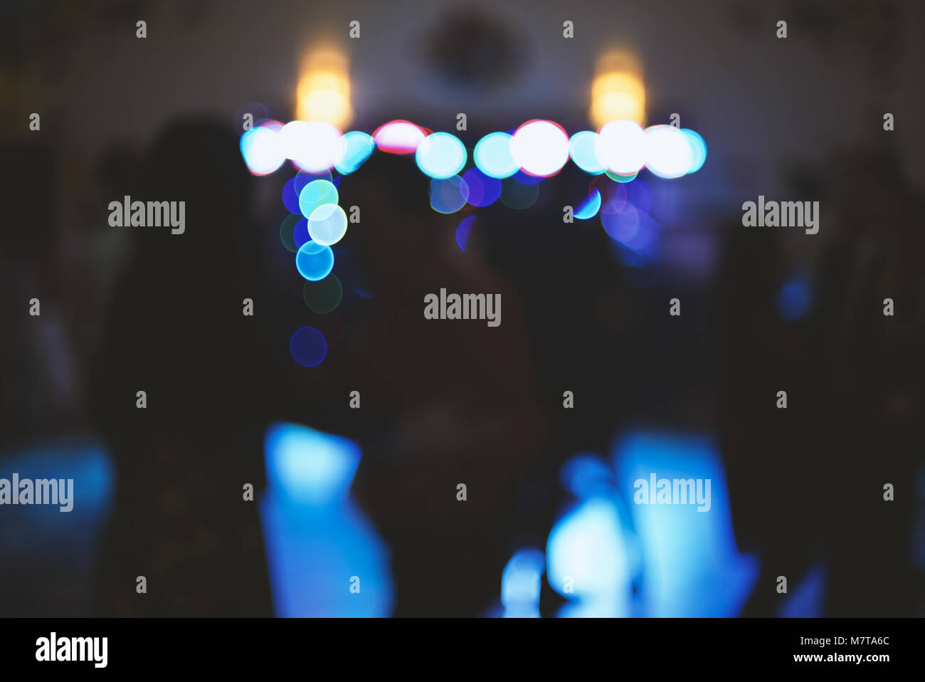 Blurry colorful background, light at a dance party, designer background for text overlay Stock Photo
