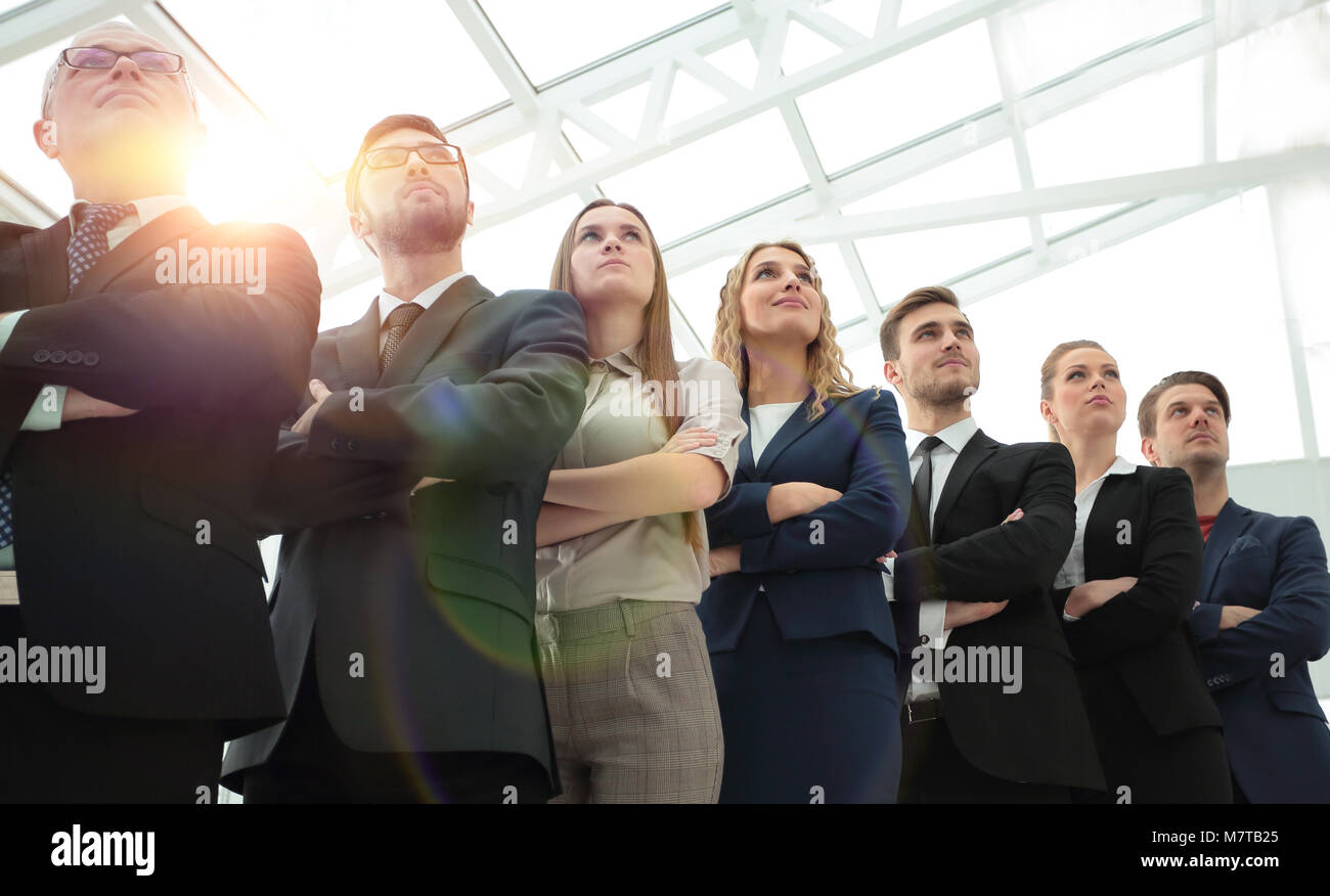 bottom view. successful business team standing together Stock Photo - Alamy
