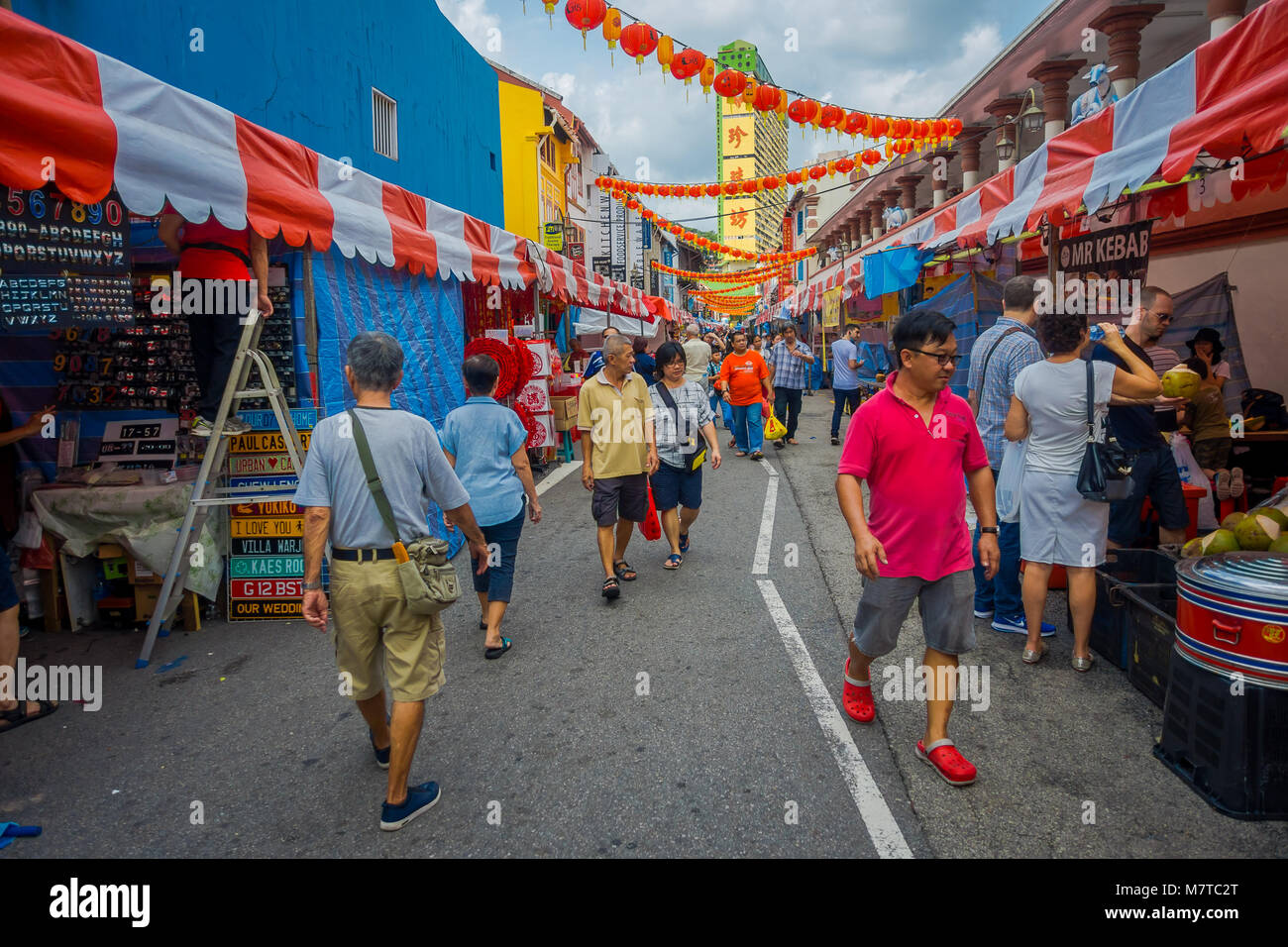 SINGAPORE, SINGAPORE - JANUARY 30. 2018: Outdoor view of unidentified people walking at public market The Lau Pa Sat festival market now used as a popular food court hawker center in Singapore Stock Photo