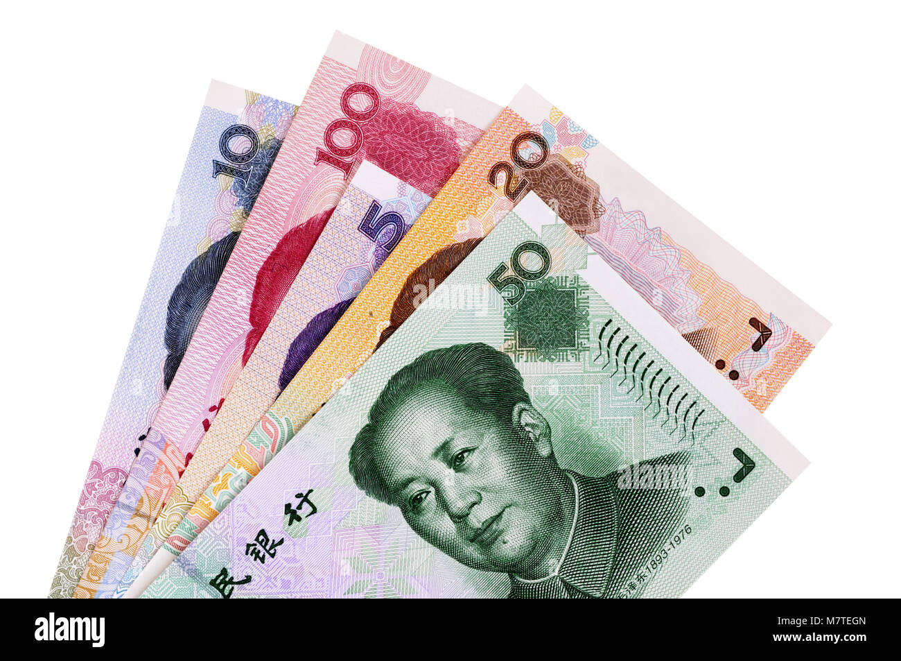 Selection of different Chinese Yuan currency bills isolated on a white background. Stock Photo