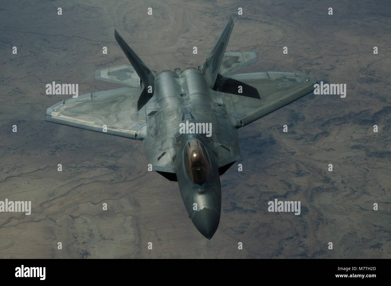 A U.S. Air Force F-22 Raptor assigned to the 95th Expeditionary Fighter ...