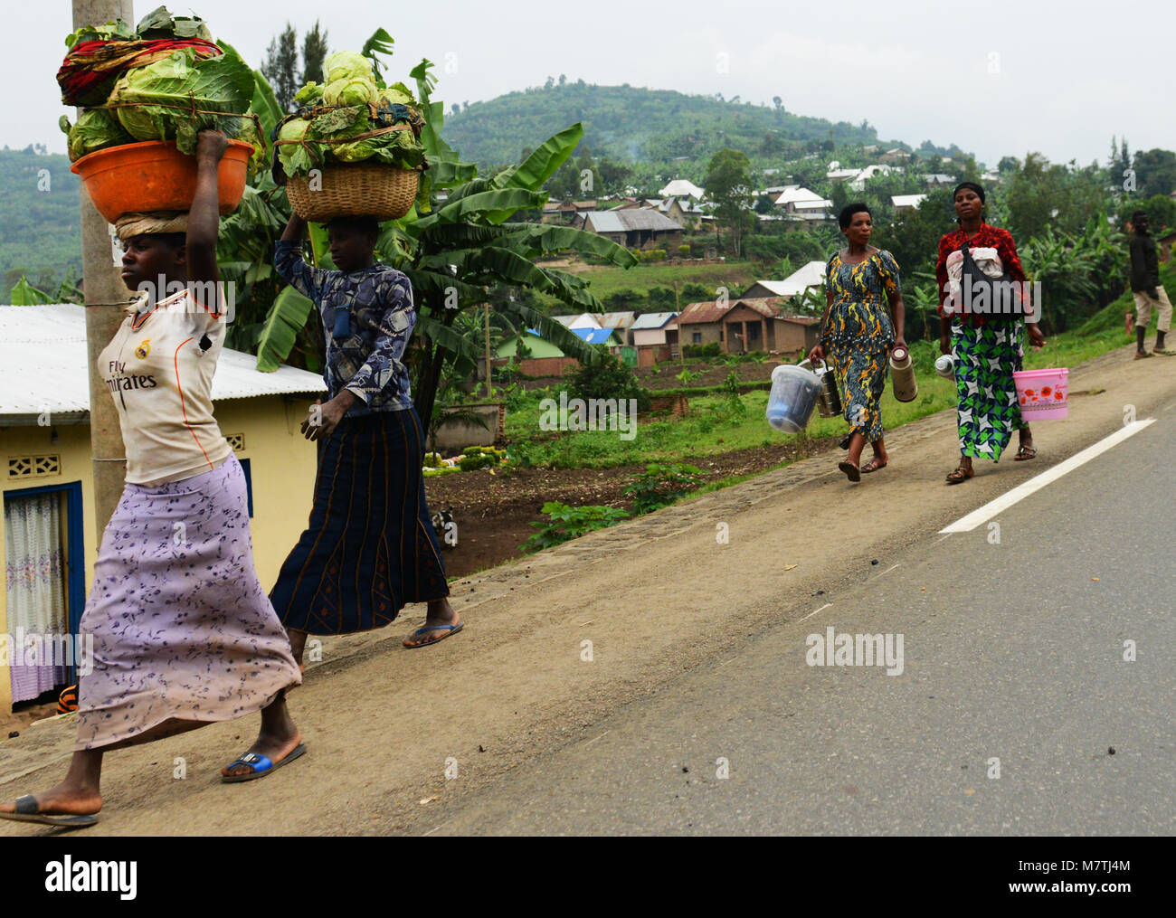 Rwandan women heading to the local market. Stock Photo