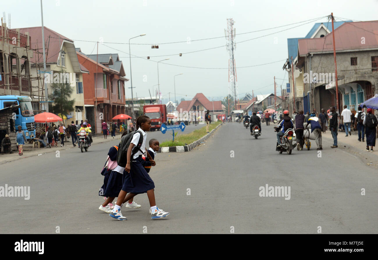 School children crossing the main road in Goma, D.R.C Stock Photo