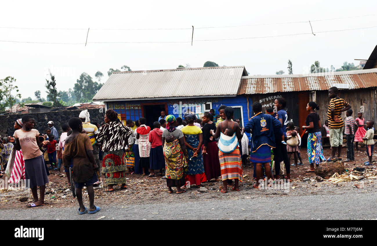 Congolese women gather outside a government welfare office in Goma. Stock Photo