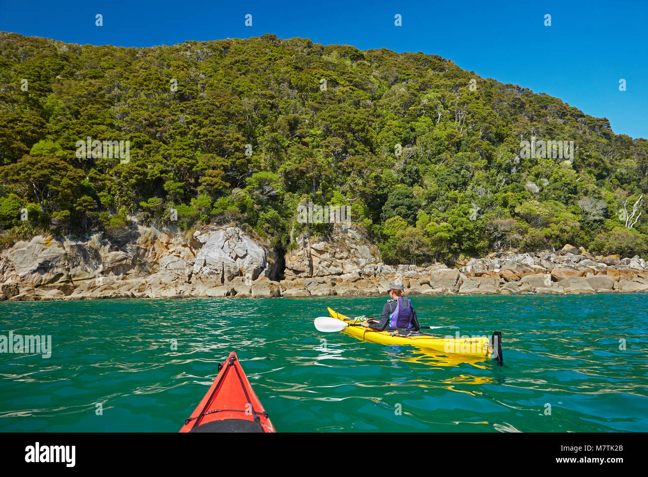 Kayakers, Adele Island, Abel Tasman National Park, Nelson Region, South Island, New Zealand (model released) Stock Photo