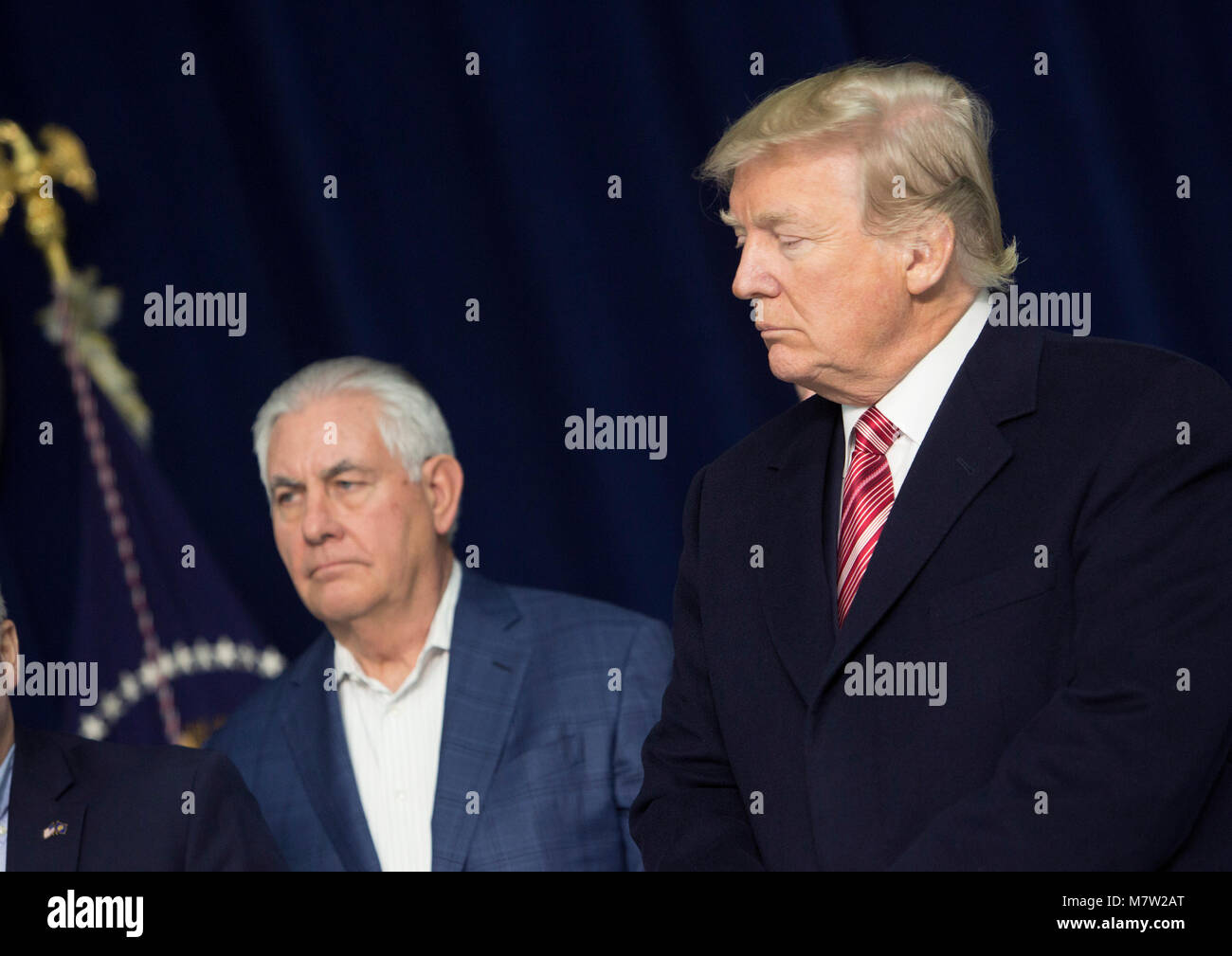 United States Secretary of State Rex Tillerson, left, listens as
