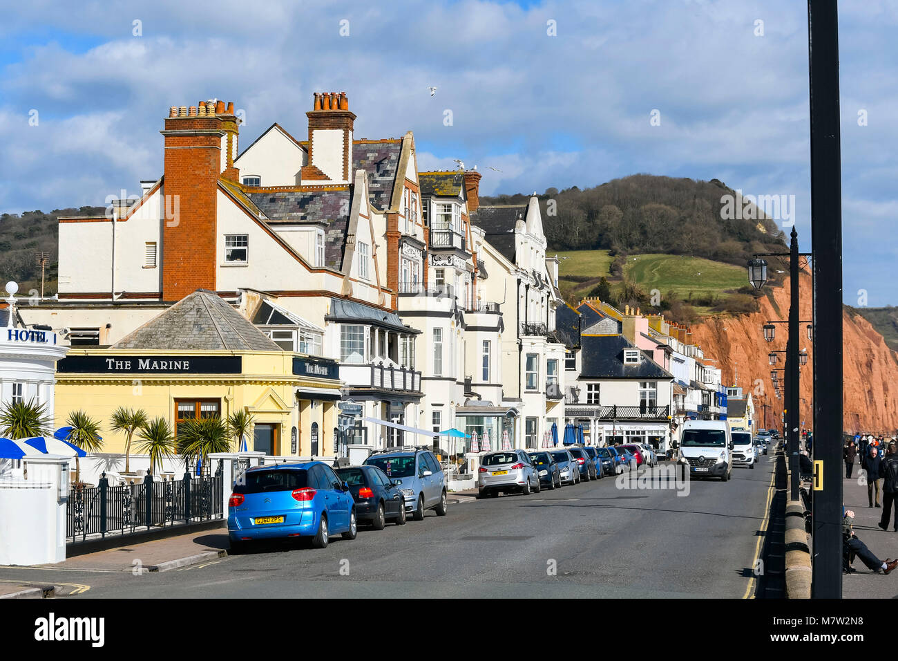 Sidmouth, Devon, UK.  13th March 2018.  UK Weather.  The seafront at the seaside town of Sidmouth in Devon on a warm sunny spring afternoon.  Picture Credit: Graham Hunt/Alamy Live News. Stock Photo