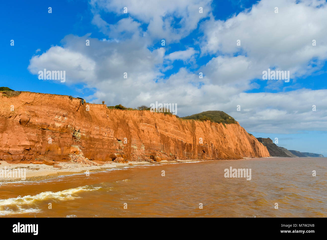 Sidmouth, Devon, UK.  13th March 2018.  UK Weather.  The cliffs at the seaside town of Sidmouth in Devon on a warm sunny spring afternoon.  Picture Credit: Graham Hunt/Alamy Live News. Stock Photo