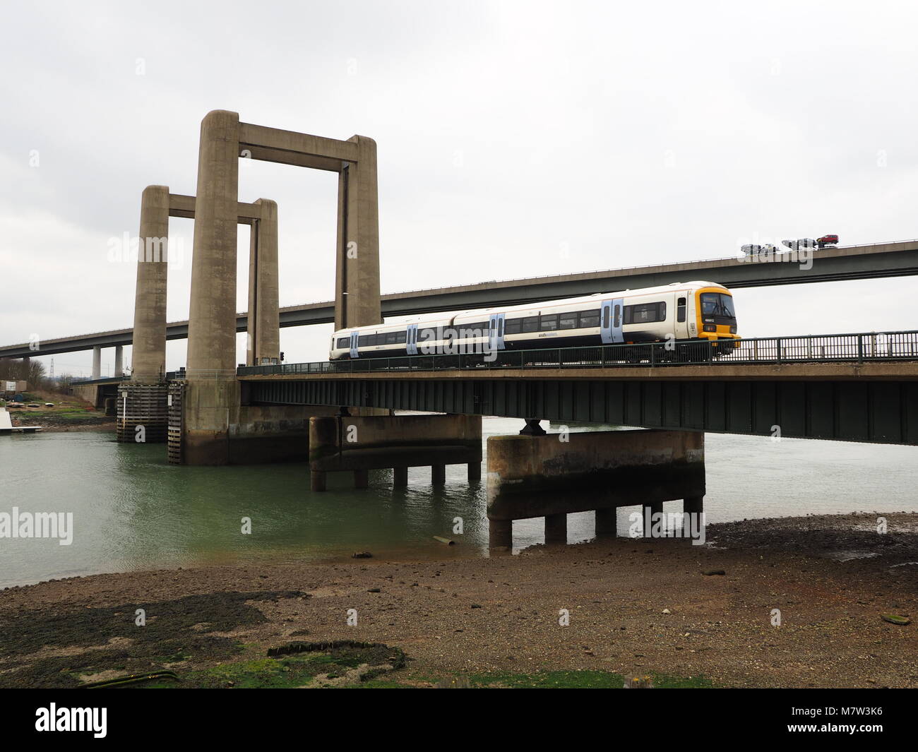 Isle of Sheppey, Kent, UK. 13th March, 2018. Divers inspect the underwater foundations of the Kingsferry Bridge which links the Isle of Sheppey to mainland Kent. The lifting bridge was opened in 1960 and still carries the only railway line onto the island. Most road traffic now uses the Sheppey Crossing which opened in 2006. Credit: James Bell/Alamy Live News Stock Photo