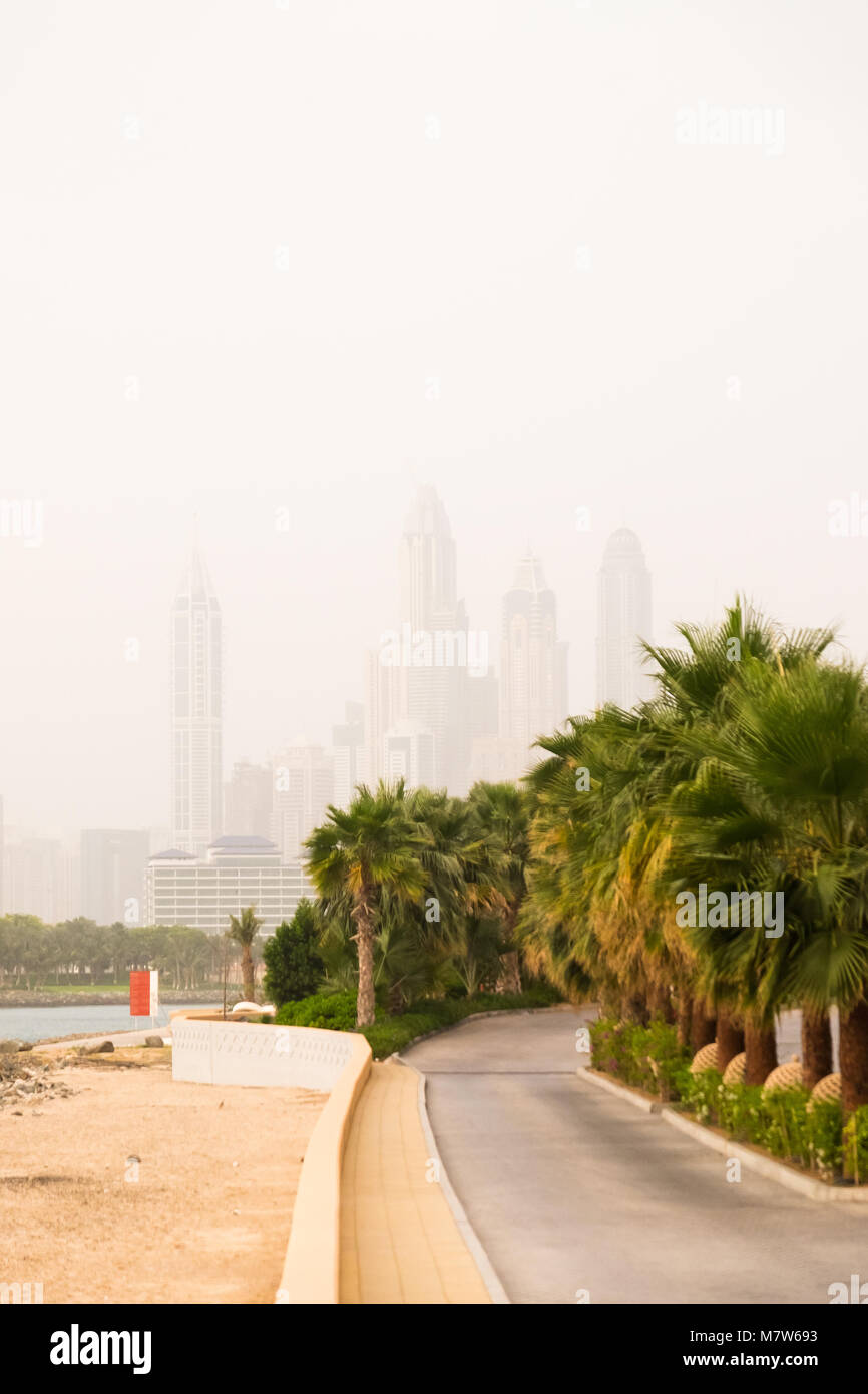 Skyscrapers in Dubai in the morning time, dusty weather Stock Photo Alamy