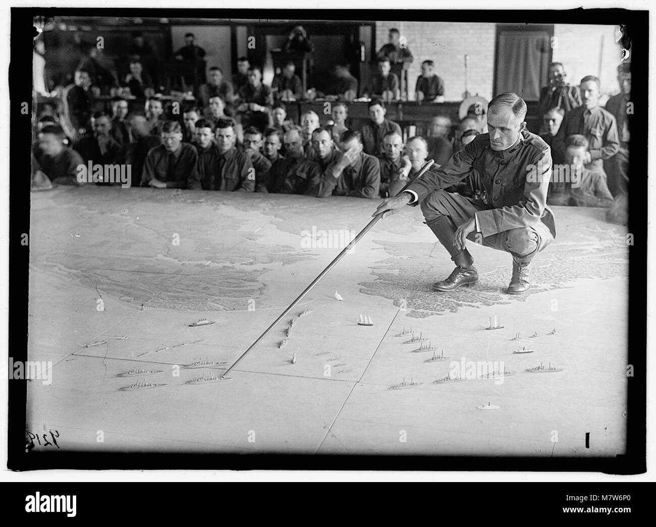 A photograph depicting military training exercises. It highlights the ...