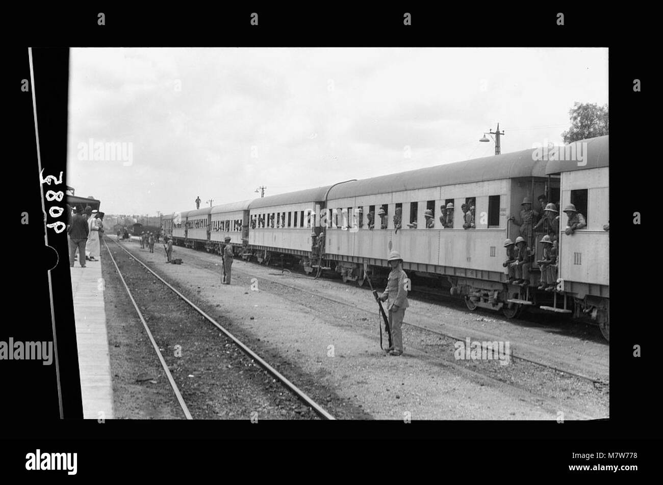 Palestine disturbances 1936. Long troops train coming into Lydda ...