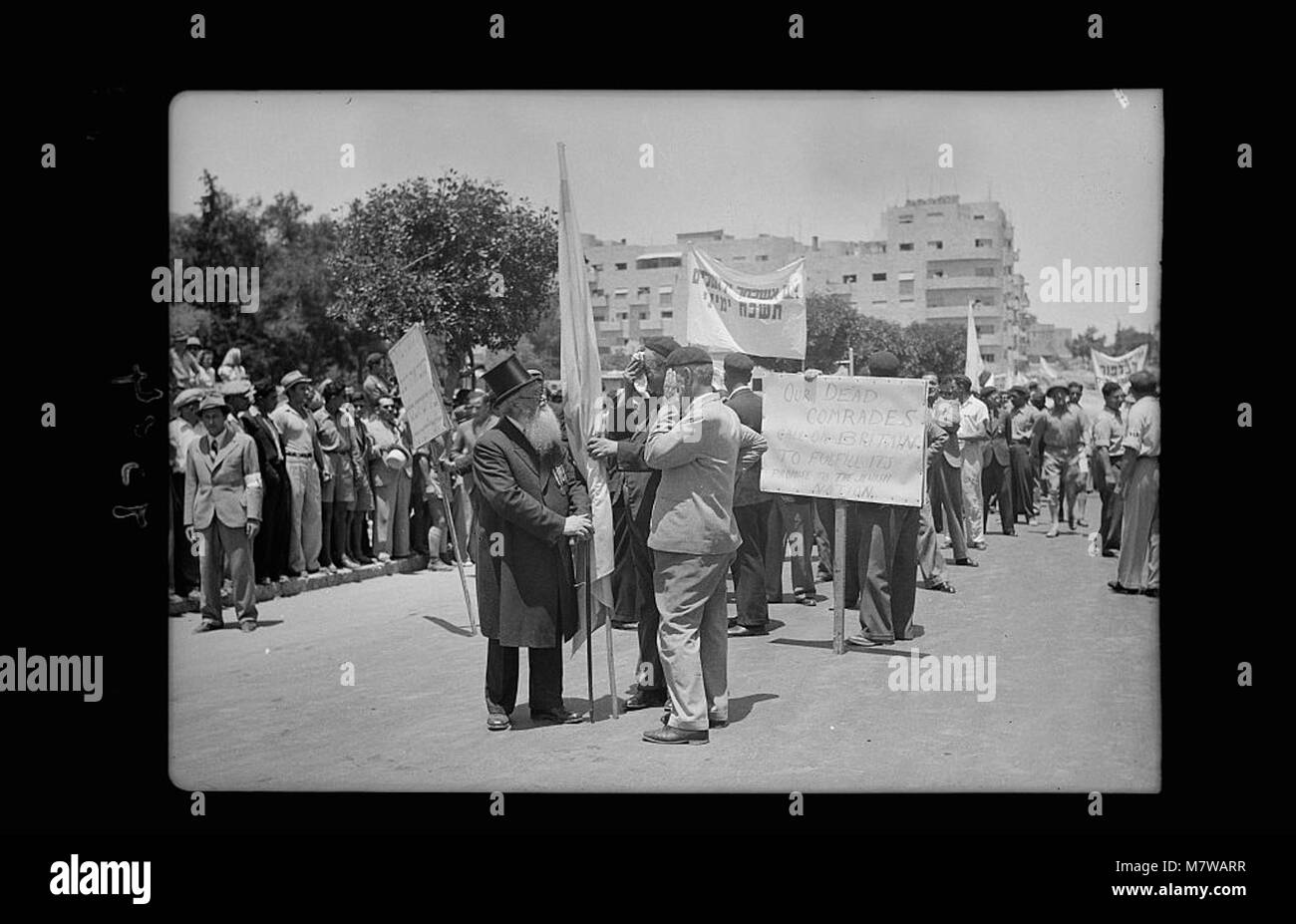 Jewish protest demonstrations against Palestine White Paper, May 18, 1939. Great War legionaries with their veteran chaplain parading on King George Ave. carrying appropriate slogans LOC matpc.18340 Stock Photo