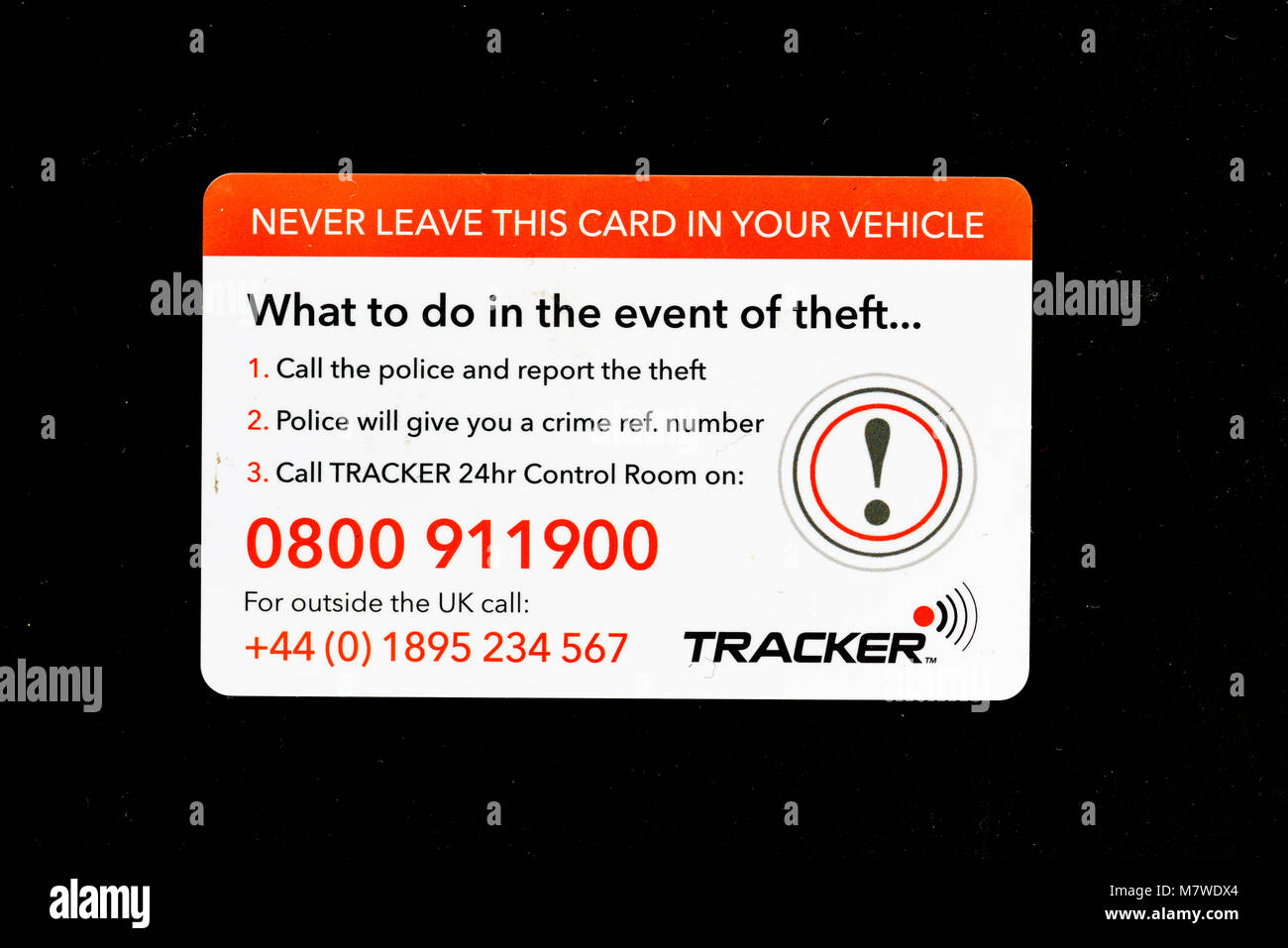 Plastic card, wallet size, of a vehicle tracked in case of theft, and giving information of what to do in the event of that happening. Stock Photo