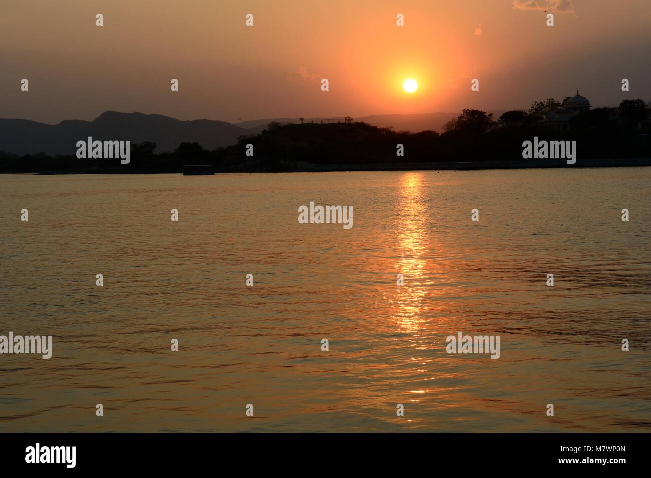 Sunset over lake Pichola Udaipur Rajashan India Stock Photo