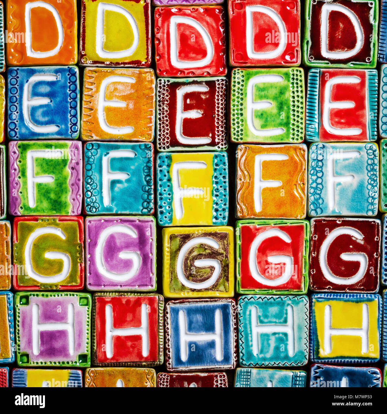 Background from colorful handmade ceramic letters Stock Photo - Alamy