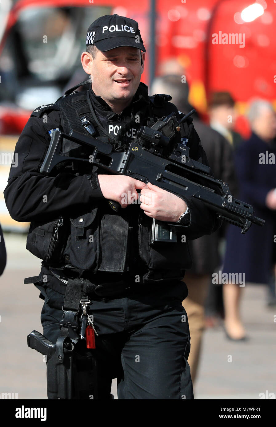 An Armed Policeman During Champion Day Of The 2018 Cheltenham Festival 