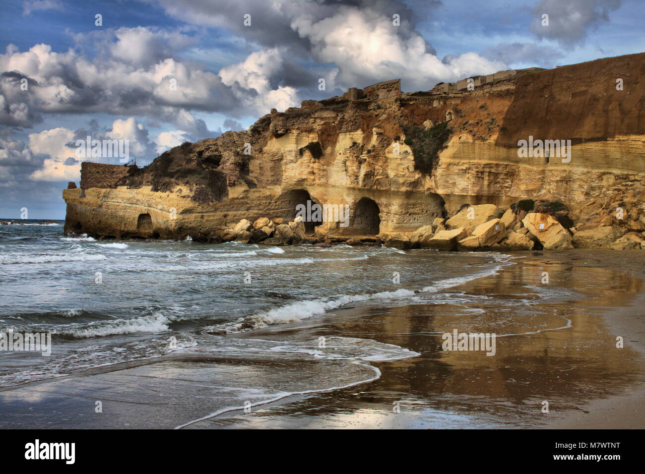 Caves in a cliff on the beach of Anzio, Italy Stock Photo