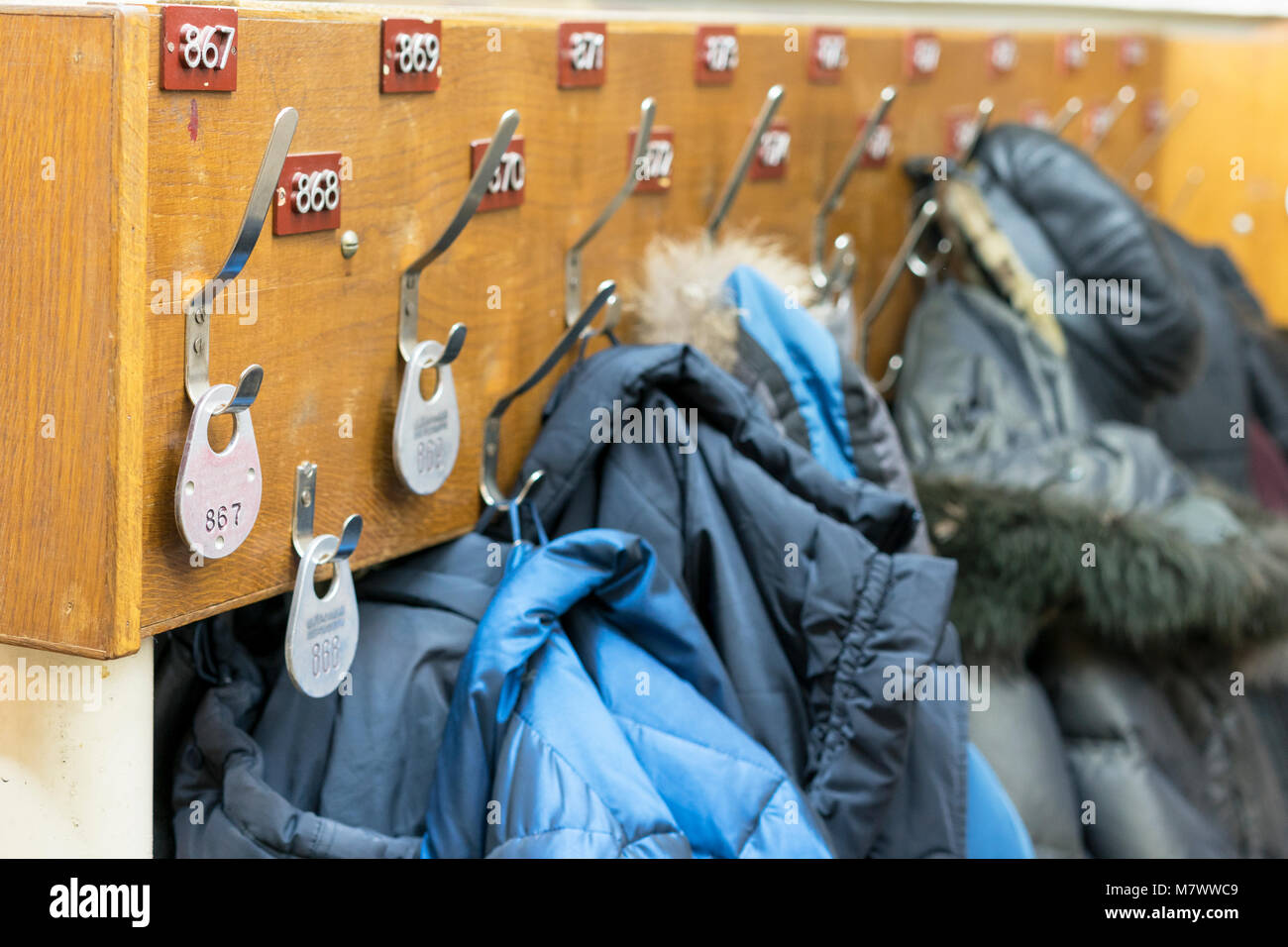 Winter clothes in the wardrobe. Protection from cold Stock Photo Alamy