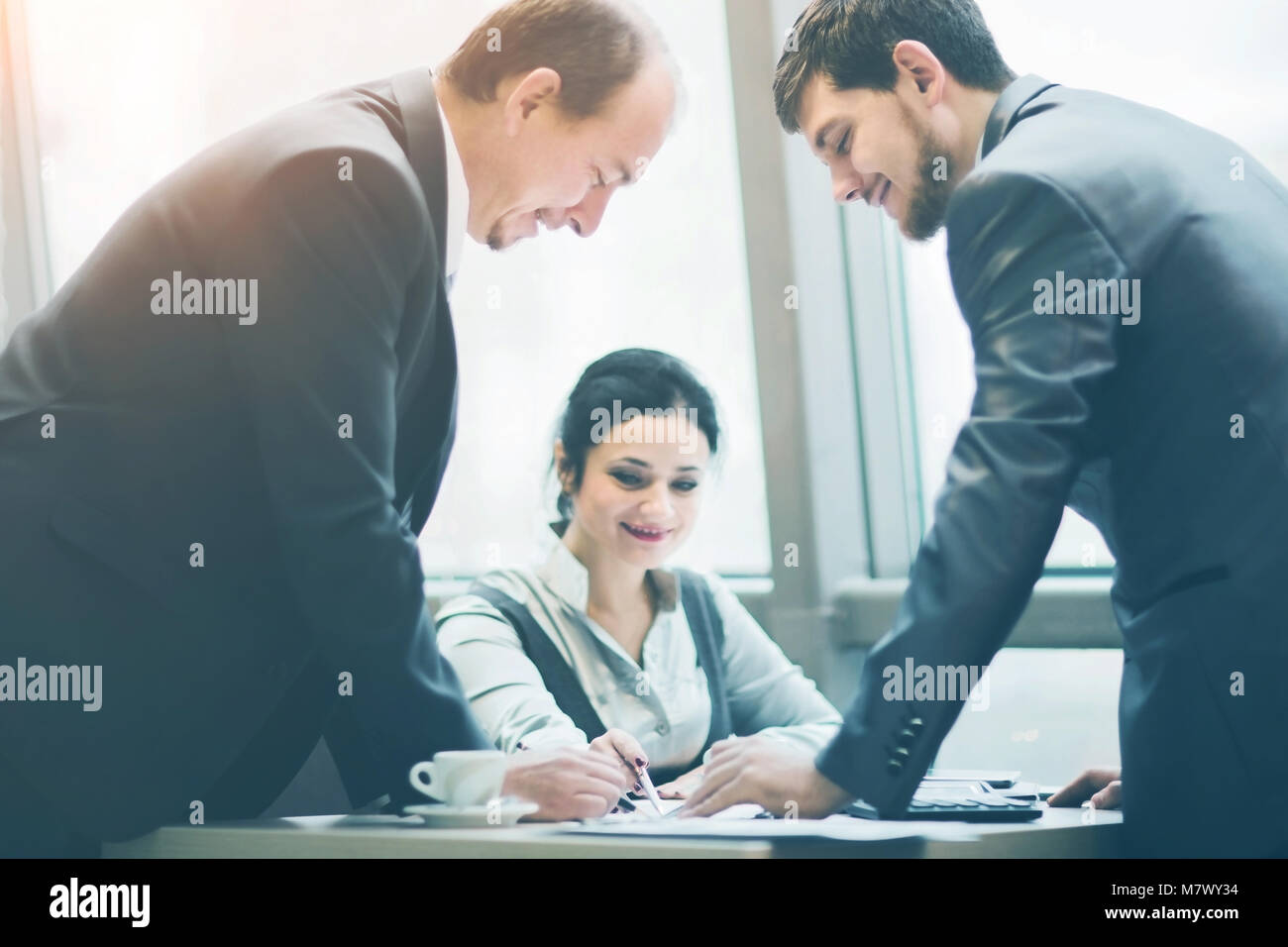 Business team working together achieve better results Stock Photo - Alamy
