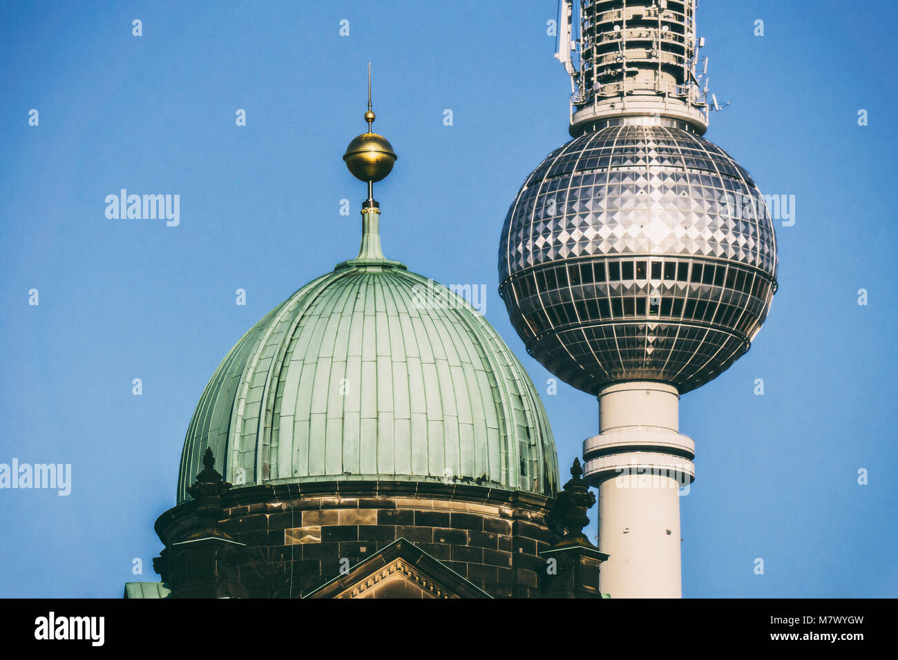 Small dome of Berlin Cathedral with TV Tower Stock Photo