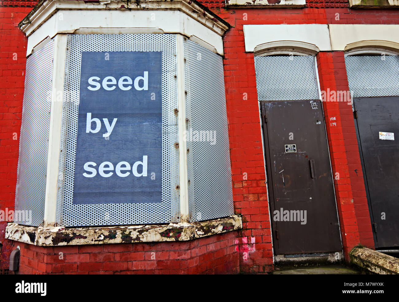 Boarded up houses next to the Homebaked bakery in Anfield Liverpool