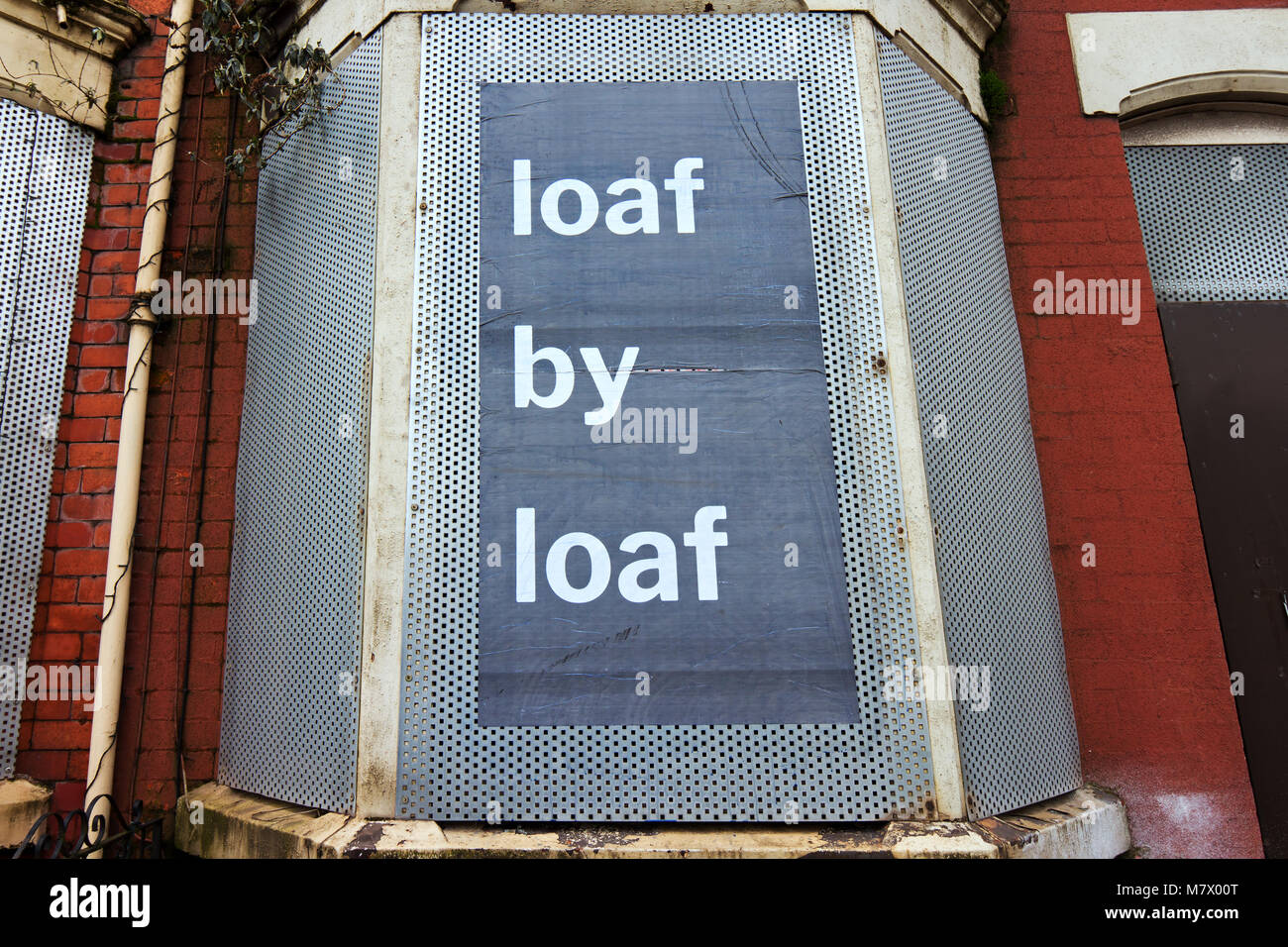 Boarded up houses next to the Homebaked bakery in Anfield Liverpool