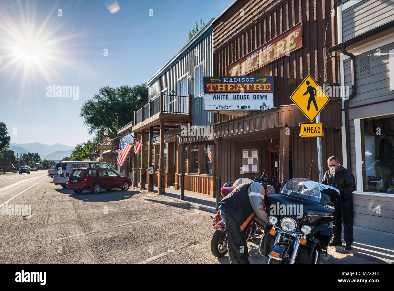Bikers on early morning on Main Street in Ennis, Madison Valley