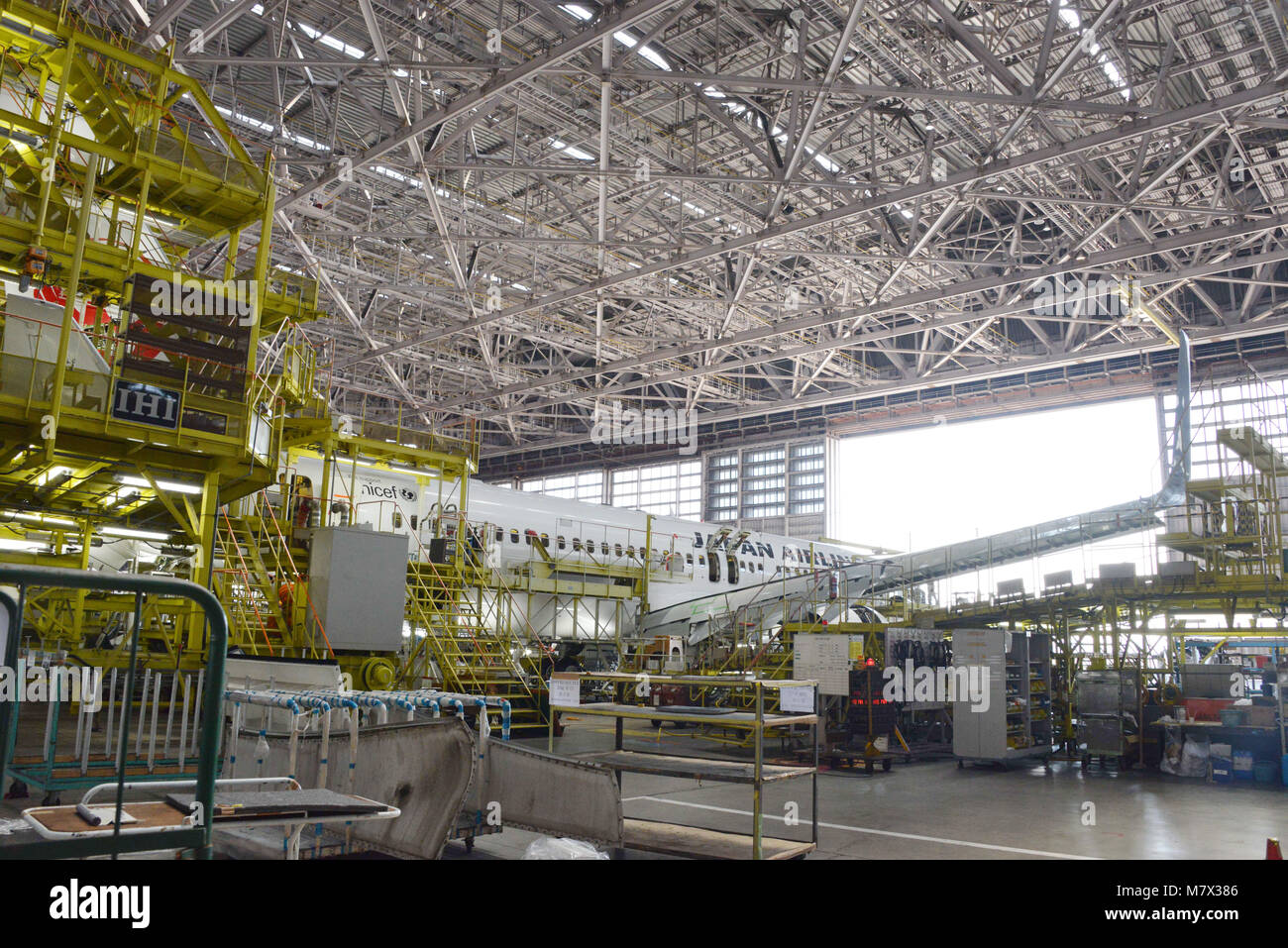 Japan, Tokyo: Boeing 737 in a Japan Airlines maintenance hangar (JAL ...