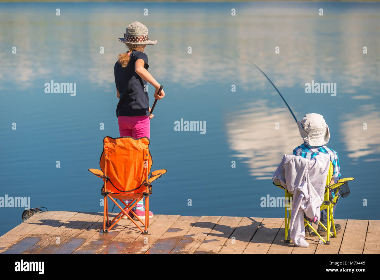 Illustration of Stickman Kids Holding Fishing Rods by the Lake Looking Up  Stock Photo - Alamy