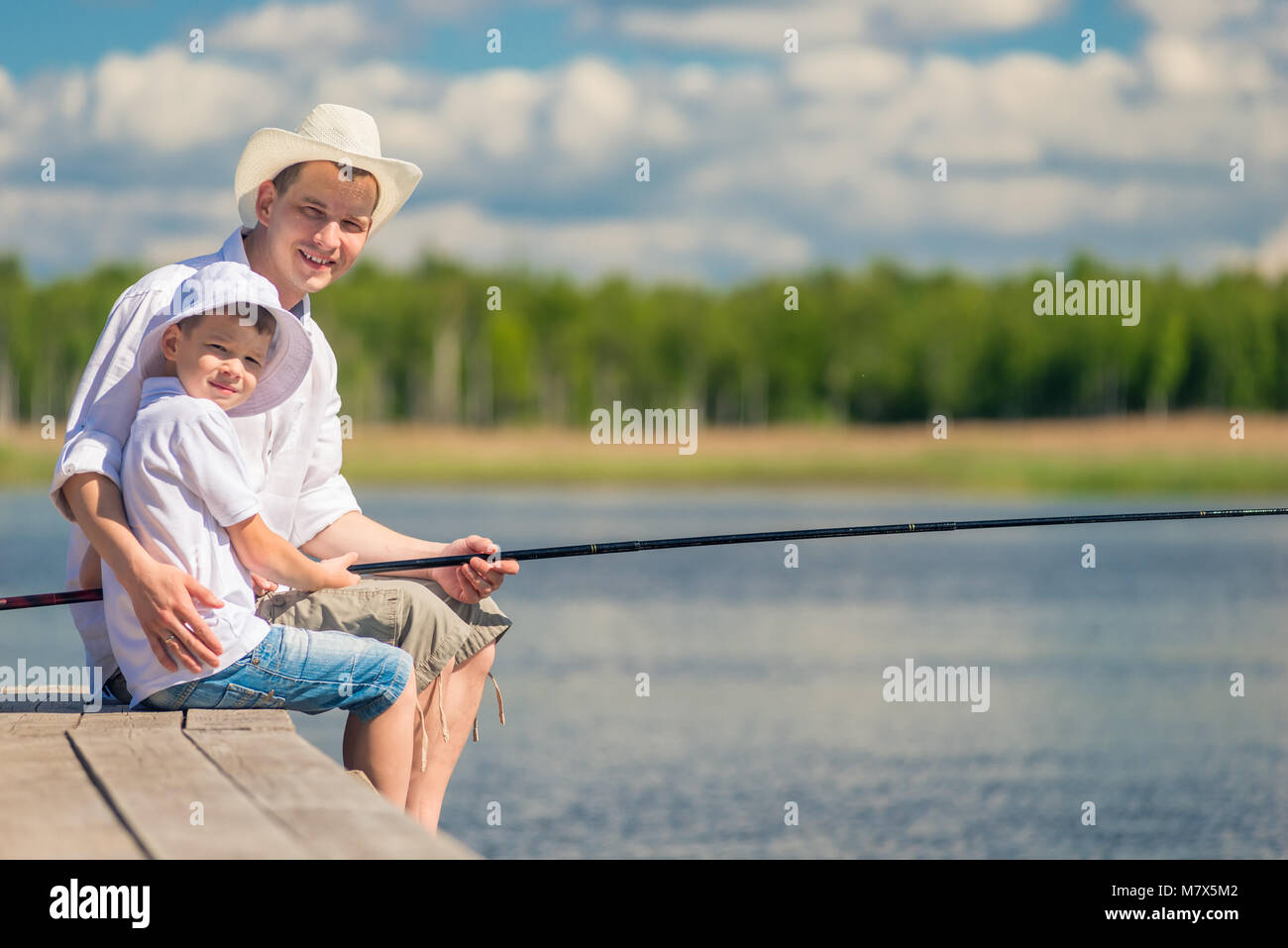 Child fishing rod hi-res stock photography and images - Page 4 - Alamy