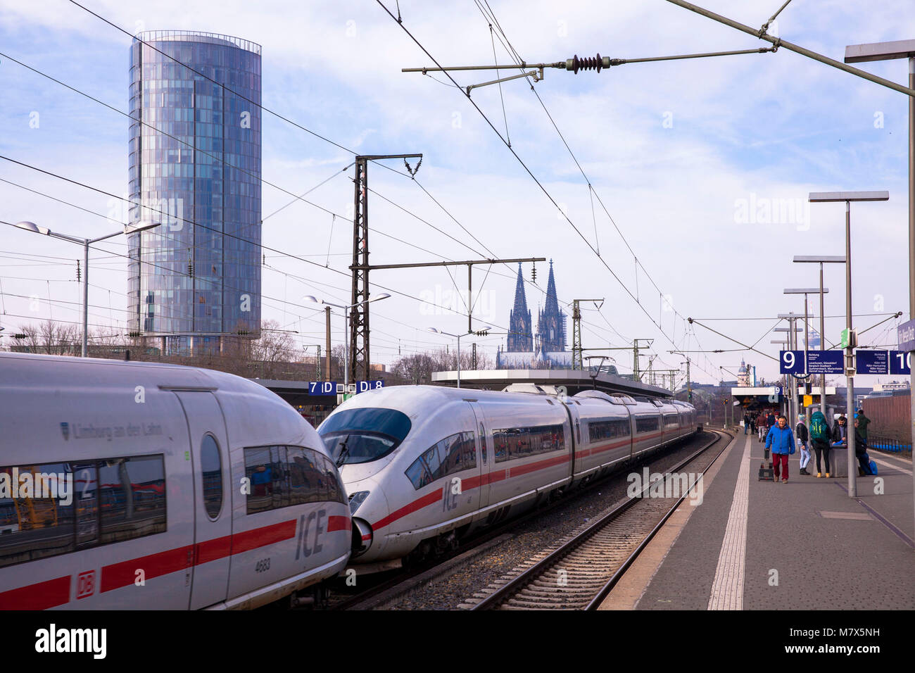 Germany, Cologne, the station Messe-Deutz, CologneTriangle Tower and the steeples of the cathedral, ICE high-speed train.  Deutschland, Koeln, der Bah Stock Photo