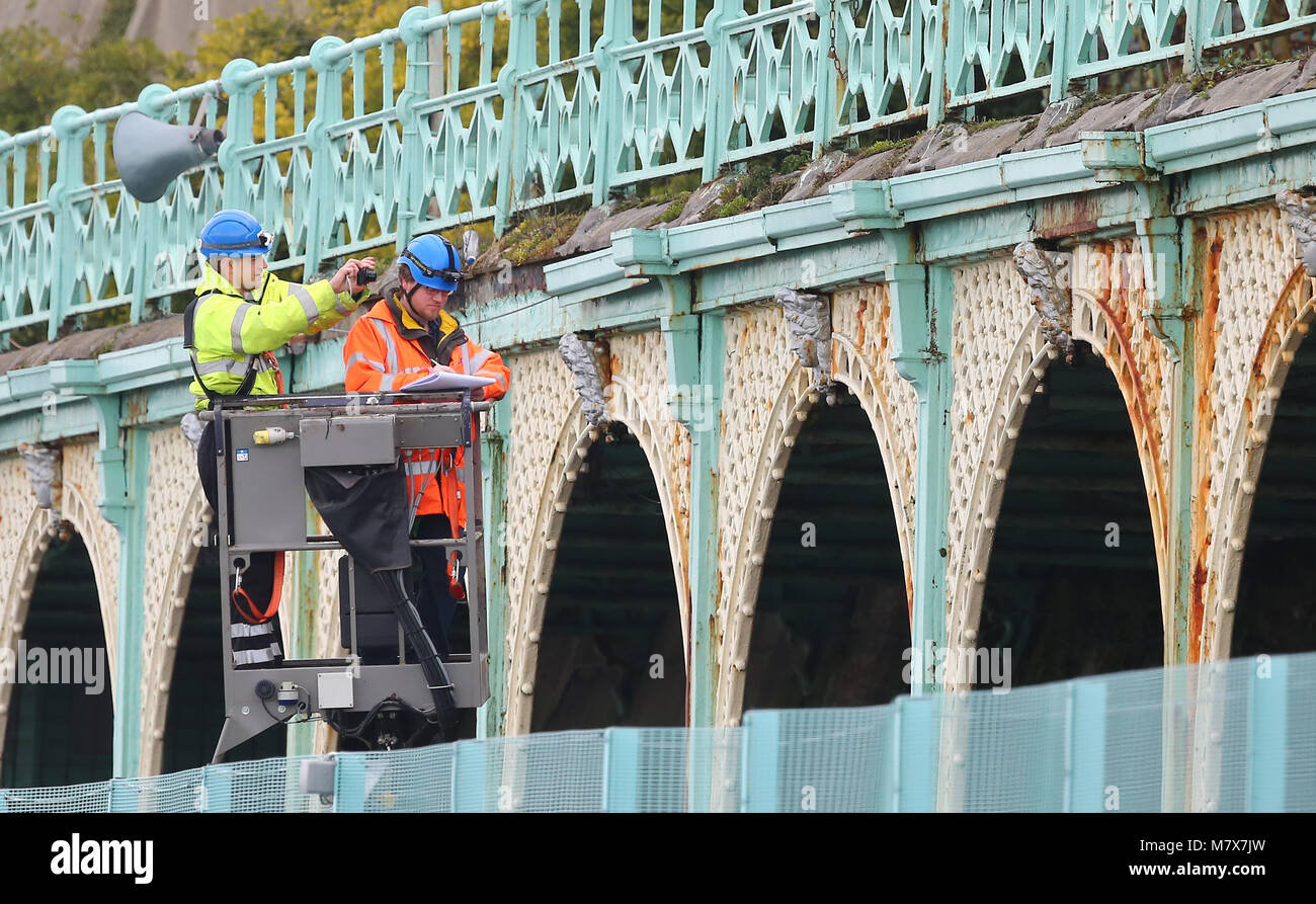 Surveyors examine the iron work on Madeira Terrace on Brighton seafront ...