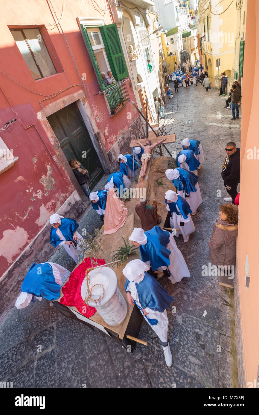PROCIDA, ITALY - MARCH 25, 2016 - Every year the procession of the "Misteri" is celebrated at Easter's Good Friday in Procida, Italy. Islanders carry through the streets elaborate and heavy "Misteries" representing scenes from The Bible. Even the children are involved in the procession. Stock Photo