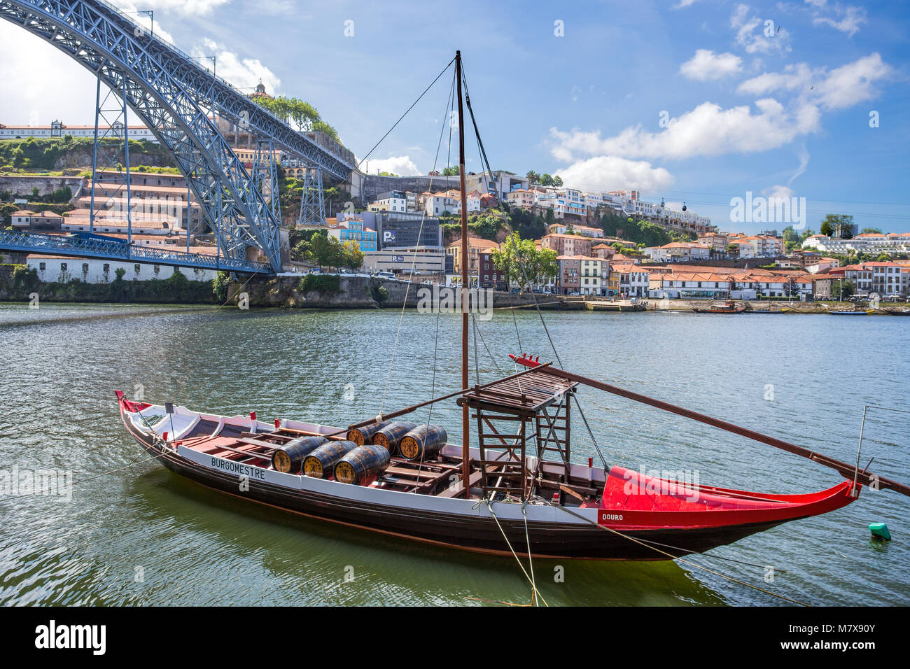 PORTO, PORTUGAL, JUNE 17, 2016 - Old town cityscape on the Douro River with traditional Rabelo boats. Stock Photo
