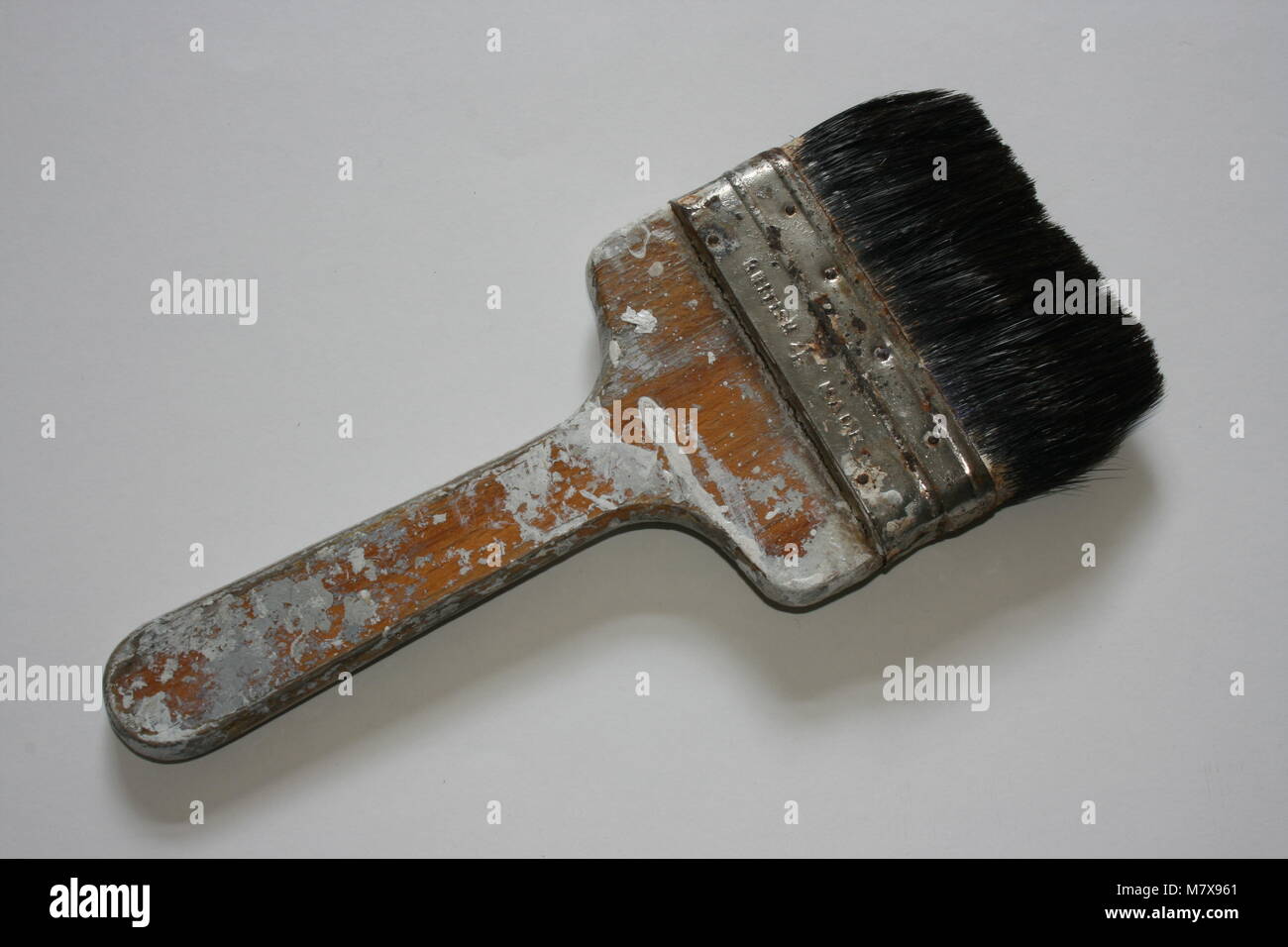 Paint speckled paintbrush Stock Photo - Alamy
