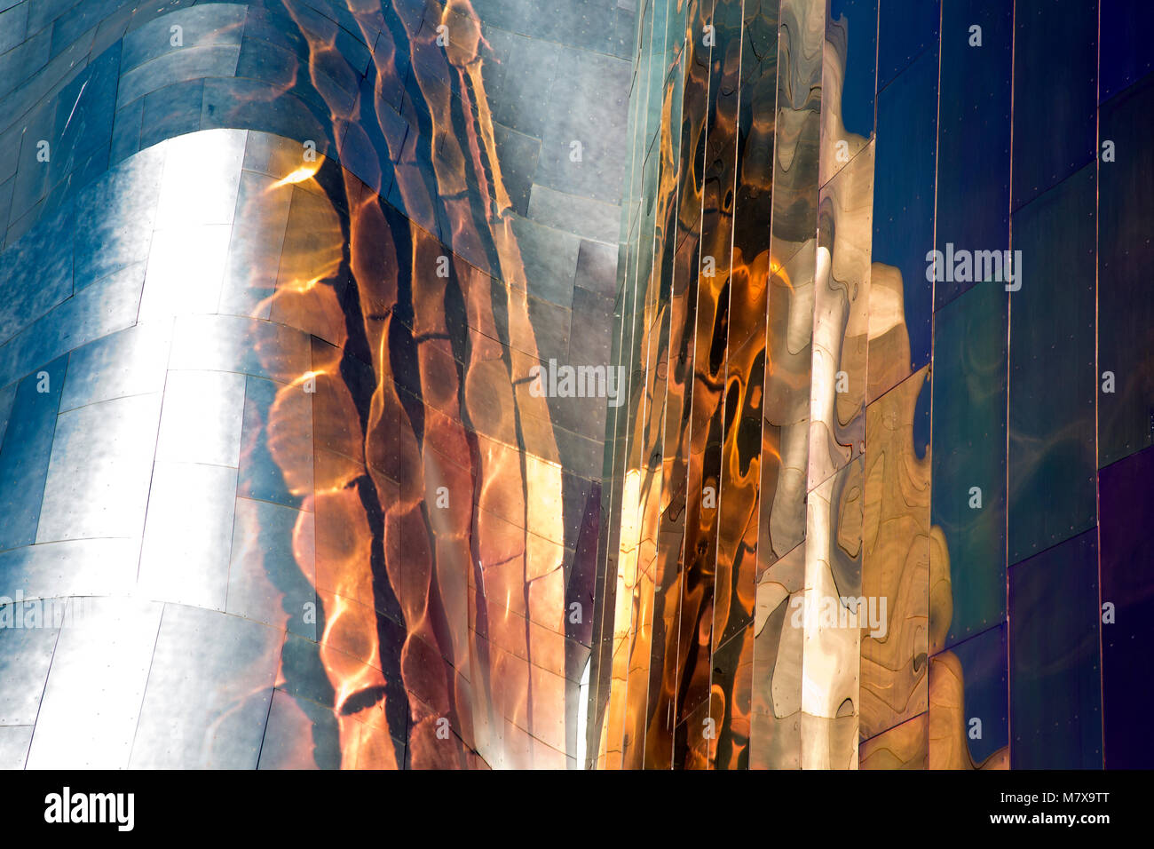 WA13803-00...WASHINGTON - Colorful reflections on the already colorful walls of the Museum of Pop Culture at the Seattle Center. 2017 Stock Photo