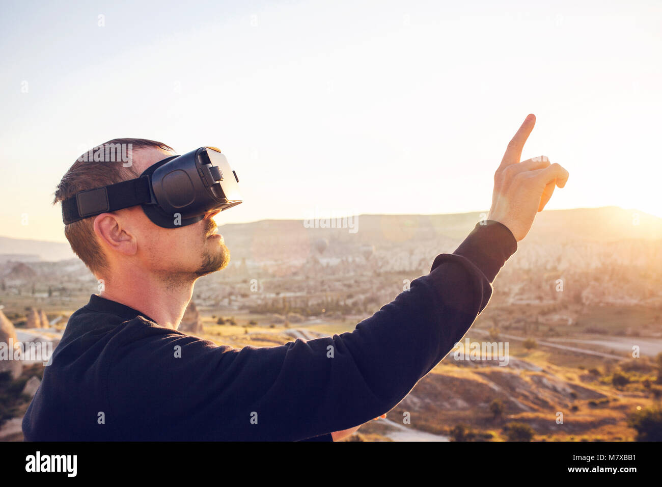 The man with glasses of virtual reality. Future technology. Modern ...