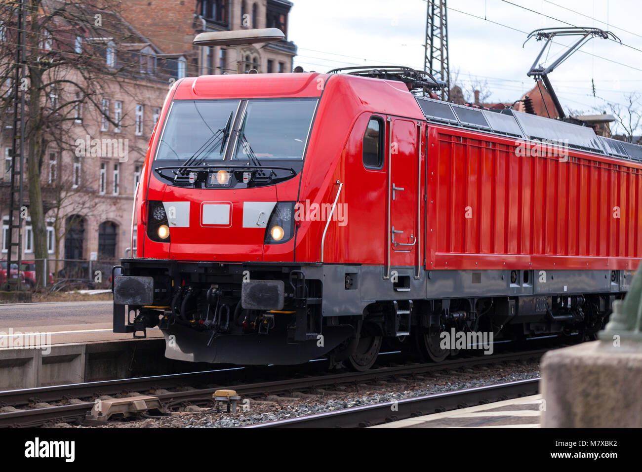 a german train passes a train station Stock Photo Alamy
