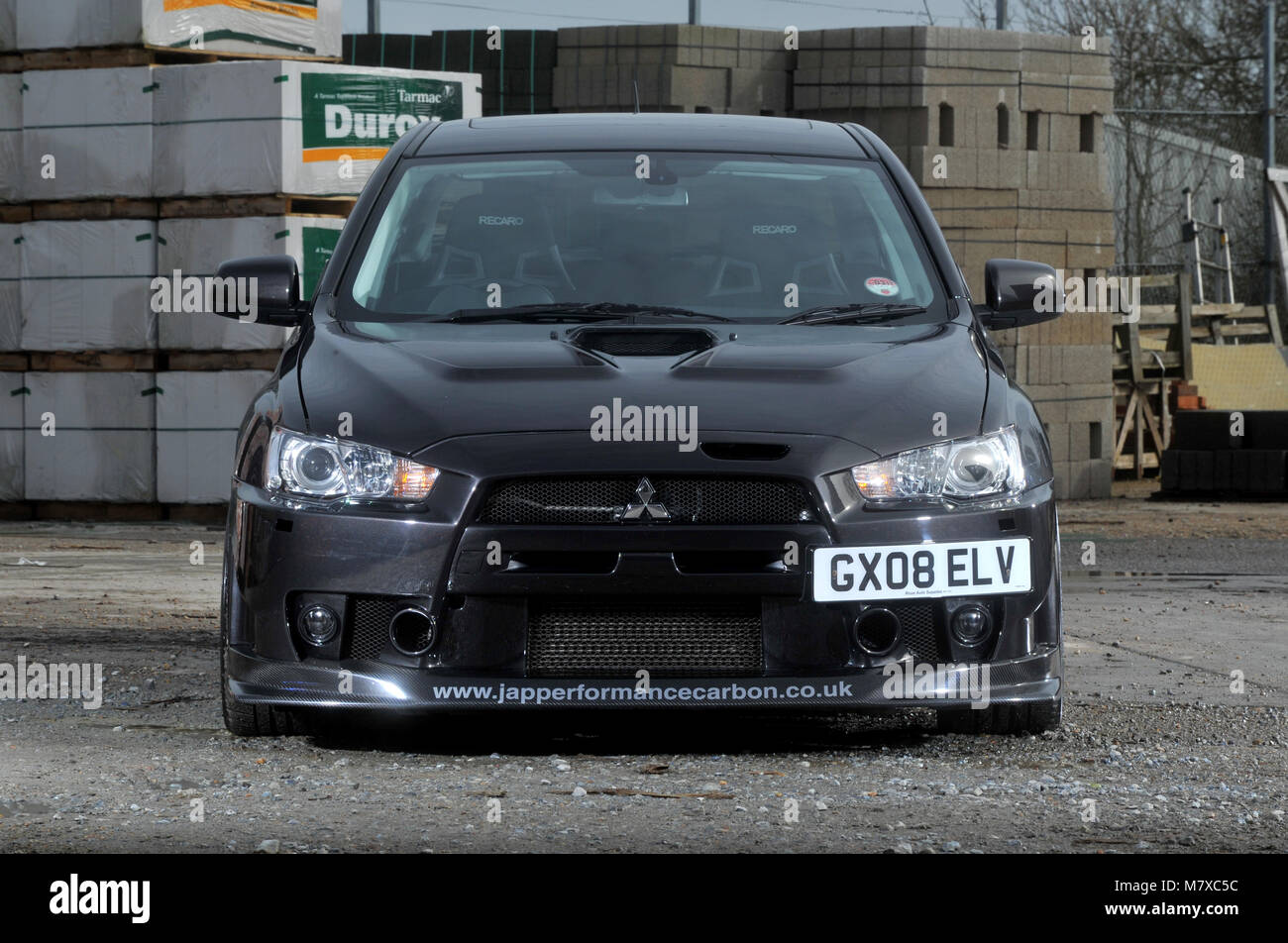 Modified Mitsubishi Evo X fast saloon car Stock Photo - Alamy