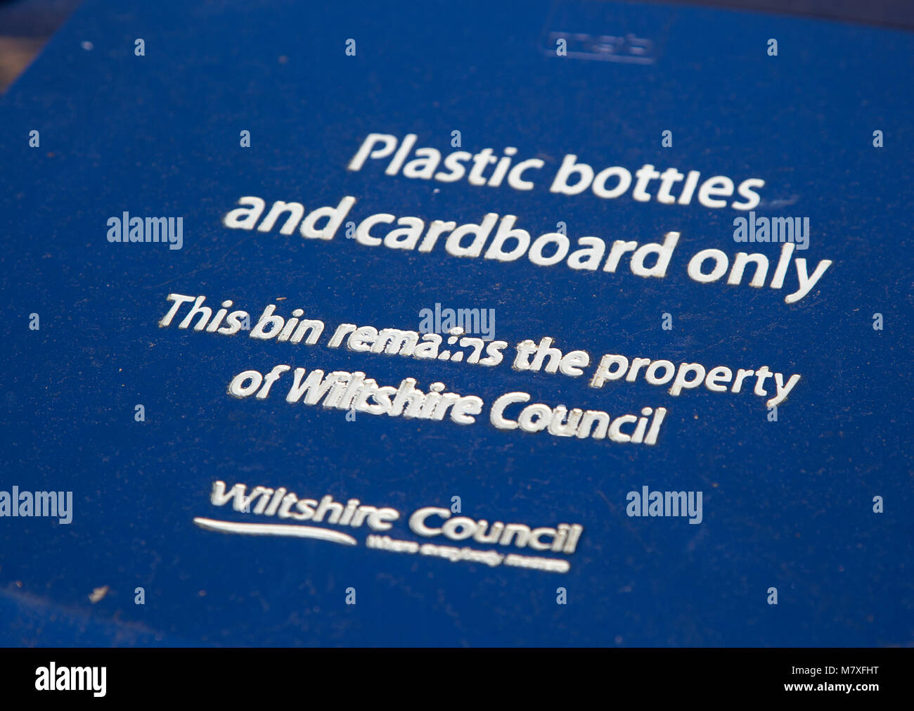 Blue recycling bin for plastic bottles and cardboard only, Wiltshire
