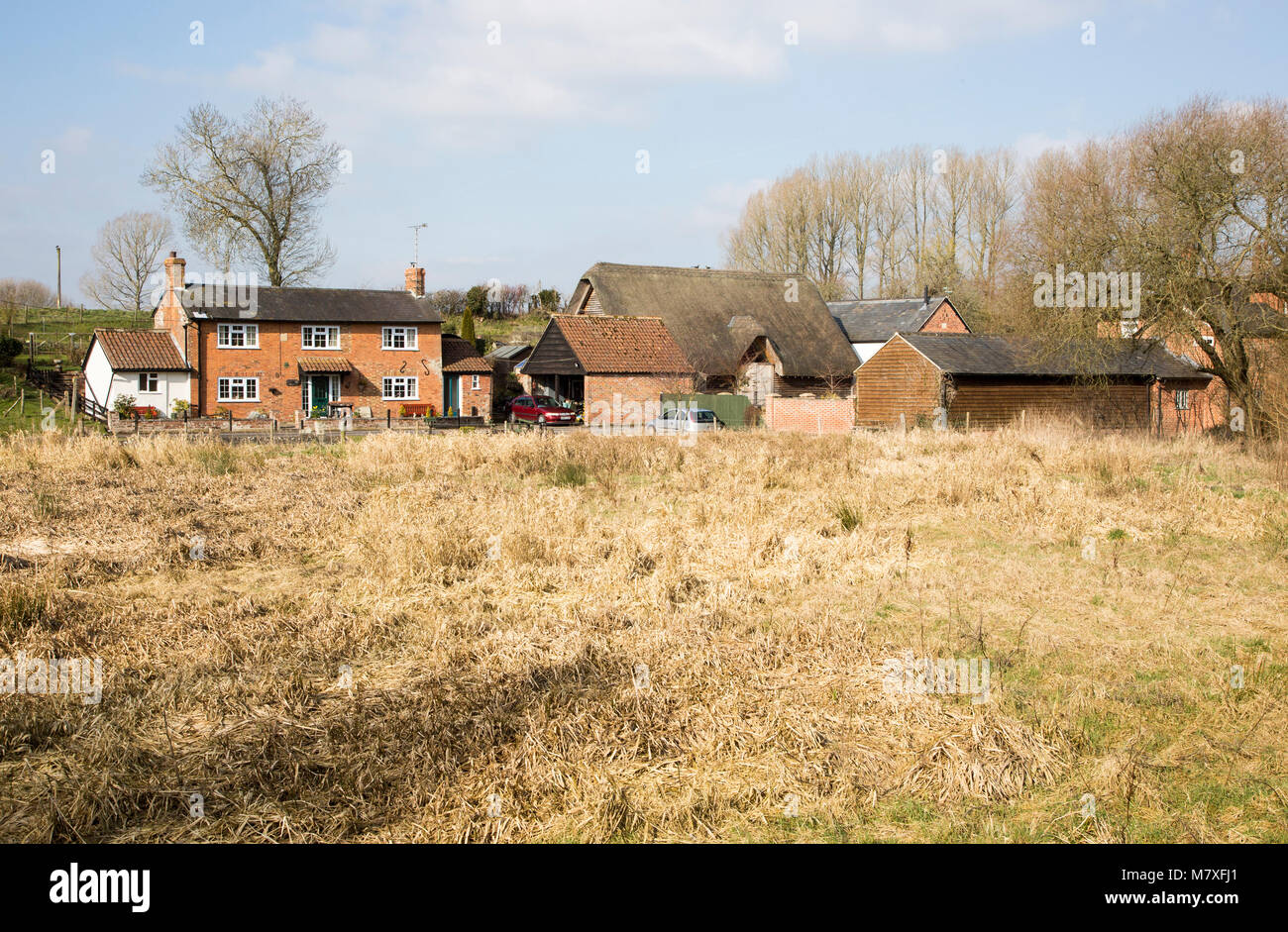 Pretty cottage and farm buildings, Marden village, Wiltshire, England