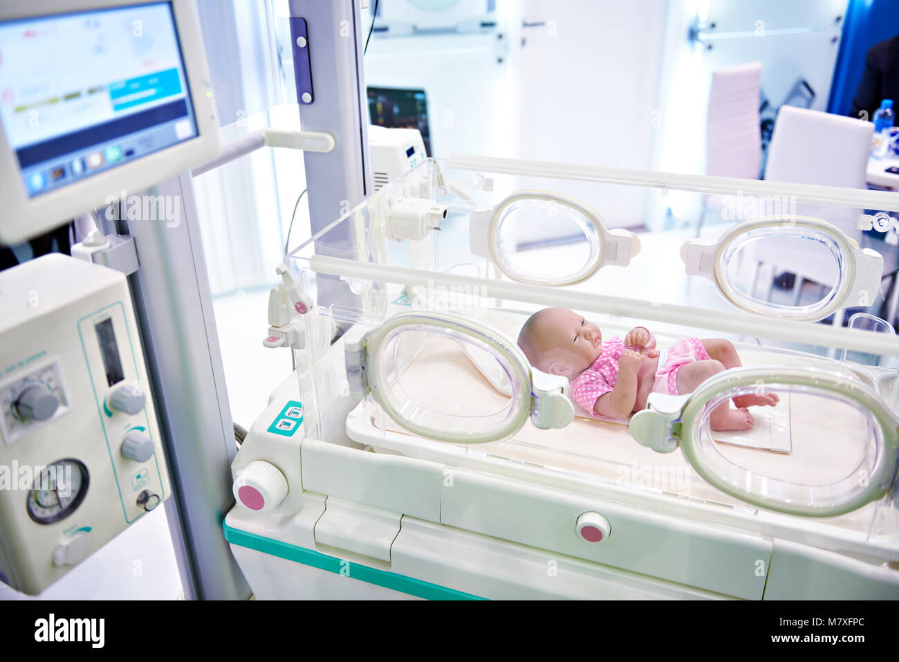 Incubator for newborns and syringe infusion pumps in clinic Stock Photo